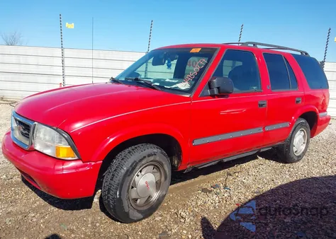 1999 GMC Jimmy Sle z USA, uszkodzony, nr VIN 1GKCS13WXX2554579